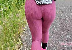 sexy ebony with huge tattooed ass runs alone in forest wearing tight leggings