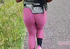 sexy ebony with huge tattooed ass runs alone in forest wearing tight leggings
