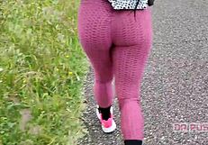 sexy ebony with huge tattooed ass runs alone in forest wearing tight leggings