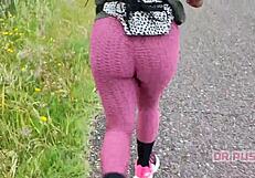 sexy ebony with huge tattooed ass runs alone in forest wearing tight leggings