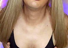 Transexual jerks her thick cock dressed sexy