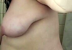 big boob mama showers washing hair then shaves smooth in homemade clip