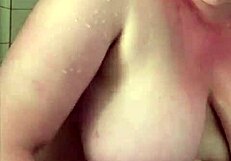 big boob mama showers washing hair then shaves smooth in homemade clip
