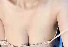 hey, check out this glasses-wearing vietnamese girl fingering herself good