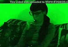 Beth's Kinky Goth Domina Smokes Seductively in Green