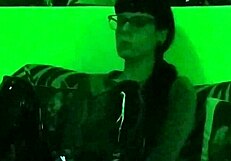 Beth's Kinky Goth Domina Smokes Seductively in Green