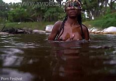wanna see this skinny african babe tease her perky tits and wet slit splashing in the river?