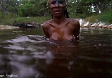 wanna see this skinny african babe tease her perky tits and wet slit splashing in the river?