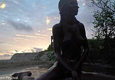 wanna see this skinny african babe tease her perky tits and wet slit splashing in the river?