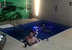 Two blondes and a monster cock bareback threesome splash in the motel pool with friends