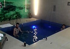 Two blondes and a monster cock bareback threesome splash in the motel pool with friends