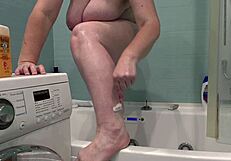 mature wife feels thrill shaving legs under bathroom camera