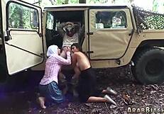 Sexy brunette army teen strips uniform for hardcore outdoor threesome group fuck!