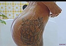 Sanktor's Shaved-Head Lesbian Fingers Herself in Tropical Villa