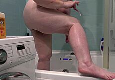 mature wife feels thrill shaving legs under bathroom camera