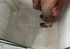 Ever seen a hung stud stroke his thick massive cock in the shower?