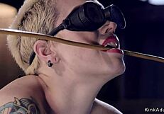 blonde slave bound in gas mask endures choking whips and rough gagging torment