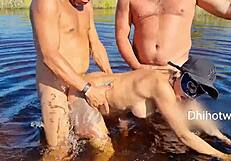 Hotwife slut pounded raw by two machos in the river!!