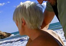 Tattooed blonde mom rides monster cock on beach