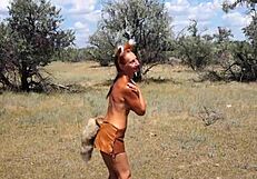 shy aboriginal milf dances in outdoor cosplay costume with amateurs