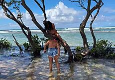 two pretty brazilian brunettes kiss and play on coral beach first time public