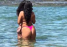 two pretty brazilian brunettes kiss and play on coral beach first time public