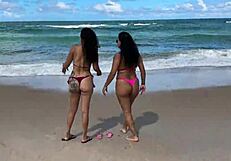 two pretty brazilian brunettes kiss and play on coral beach first time public