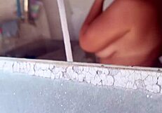 i peek through the window watching my stepmom shower it turns me on so i follow to fuck her