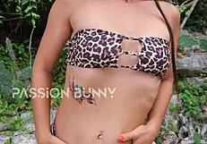 Bikini-Clad Tropical Beauty Dances Teasingly Before Fingering Her Wet Pussy Outdoors