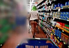 Latina without panties flashing skirt in supermarket?