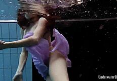 Does Blackhaired Aneta's Bikini Slip Reveal Poolside Nude Tease?