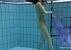 Does Blackhaired Aneta's Bikini Slip Reveal Poolside Nude Tease?