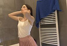 i love my braless curves in this tight pink skirt