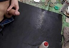 Skinny solo amateur jerks monster cock on workbench at work site