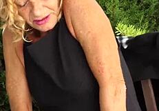 hot mature teacher spreads shaved pussy outdoors in heels!