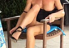 hot mature teacher spreads shaved pussy outdoors in heels!