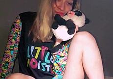 bonneyuwu slips into pijama for cute dildo play with her soft peluche on bed