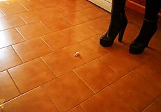 mistress in tall heels and boots dominates huge slave in garage bdsm session with ass worship