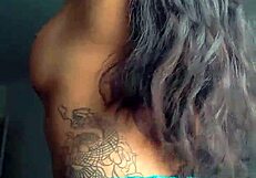 tattooed black prostitute flaunts ass pussy and cock sucking skills