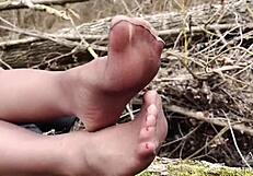 wanna worship my nylon pantyhose feet spread wide in the forest goddess?