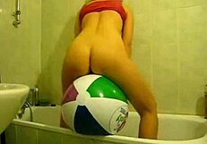 sophie fingers her hairy pussy with balloons in bathroom and living room now