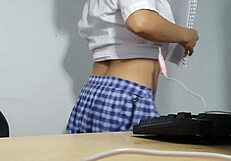 Beautiful student sings excitedly while tackling her uniform homework assignment at home