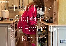 kicking off furry slippers to tease bare feet in kitchen