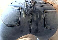 mature 58-year-old moans for cum in jean-covered ass