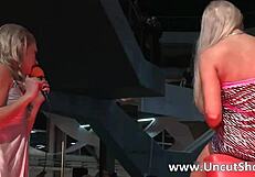 two blond babes strip and fuck on public stage