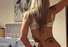 sexy slut teases with her blonde curves and hungry gaze