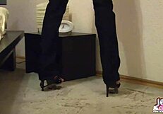 she slips from her skinny jeans while you watch her panties