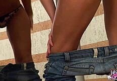 she slips from her skinny jeans while you watch her panties