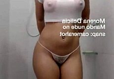Hey, watch this thick ass dancer flash her wet slit while shaking