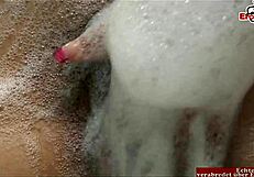 hairy teen with natural tits rubs one out in the bathtub